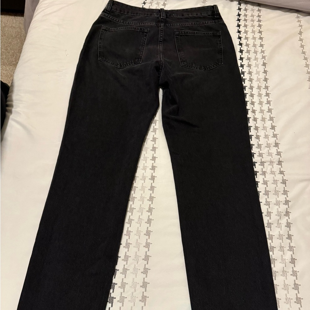 Zara jeans with glitter on the front.